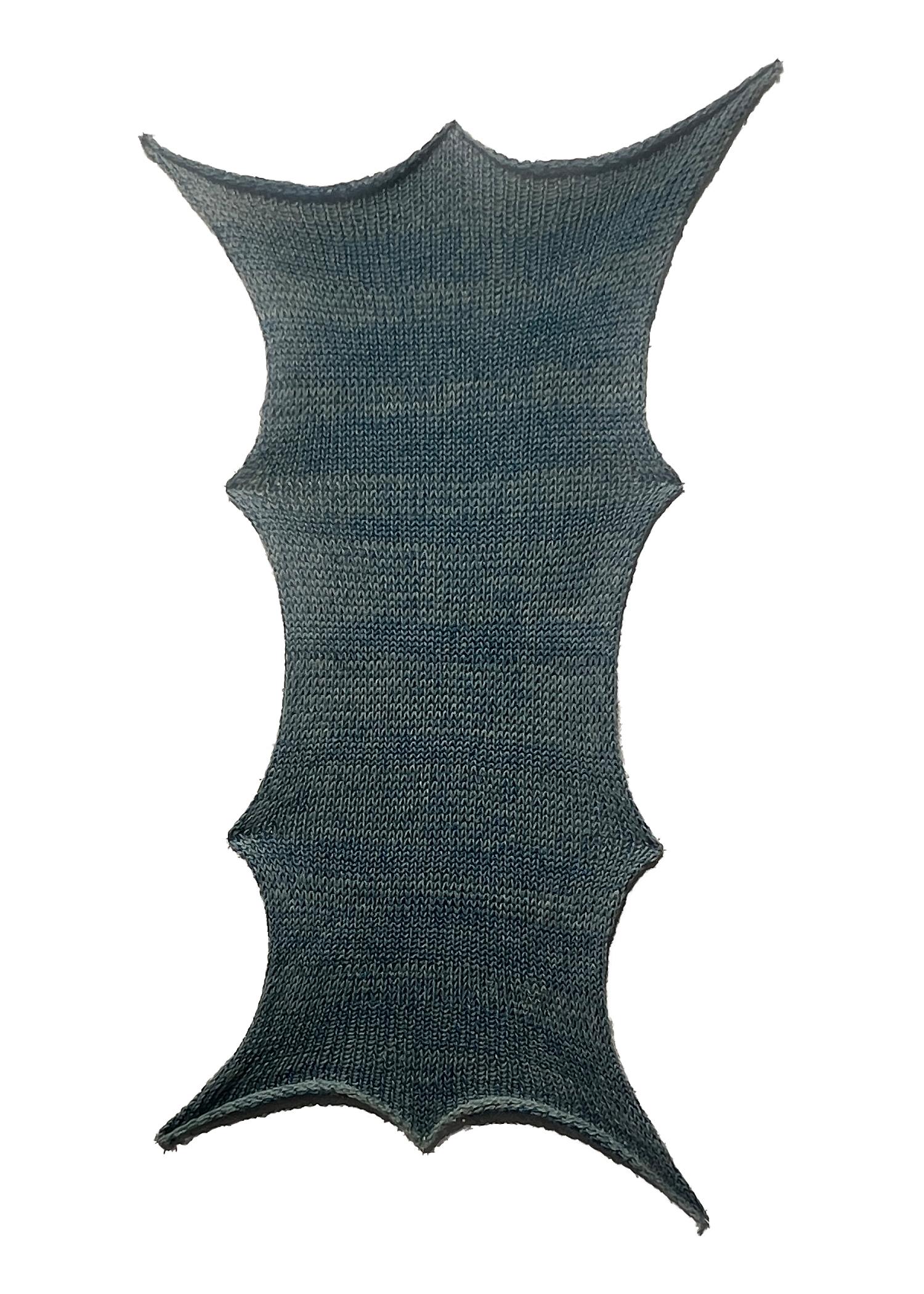 man walking in front of textured wall