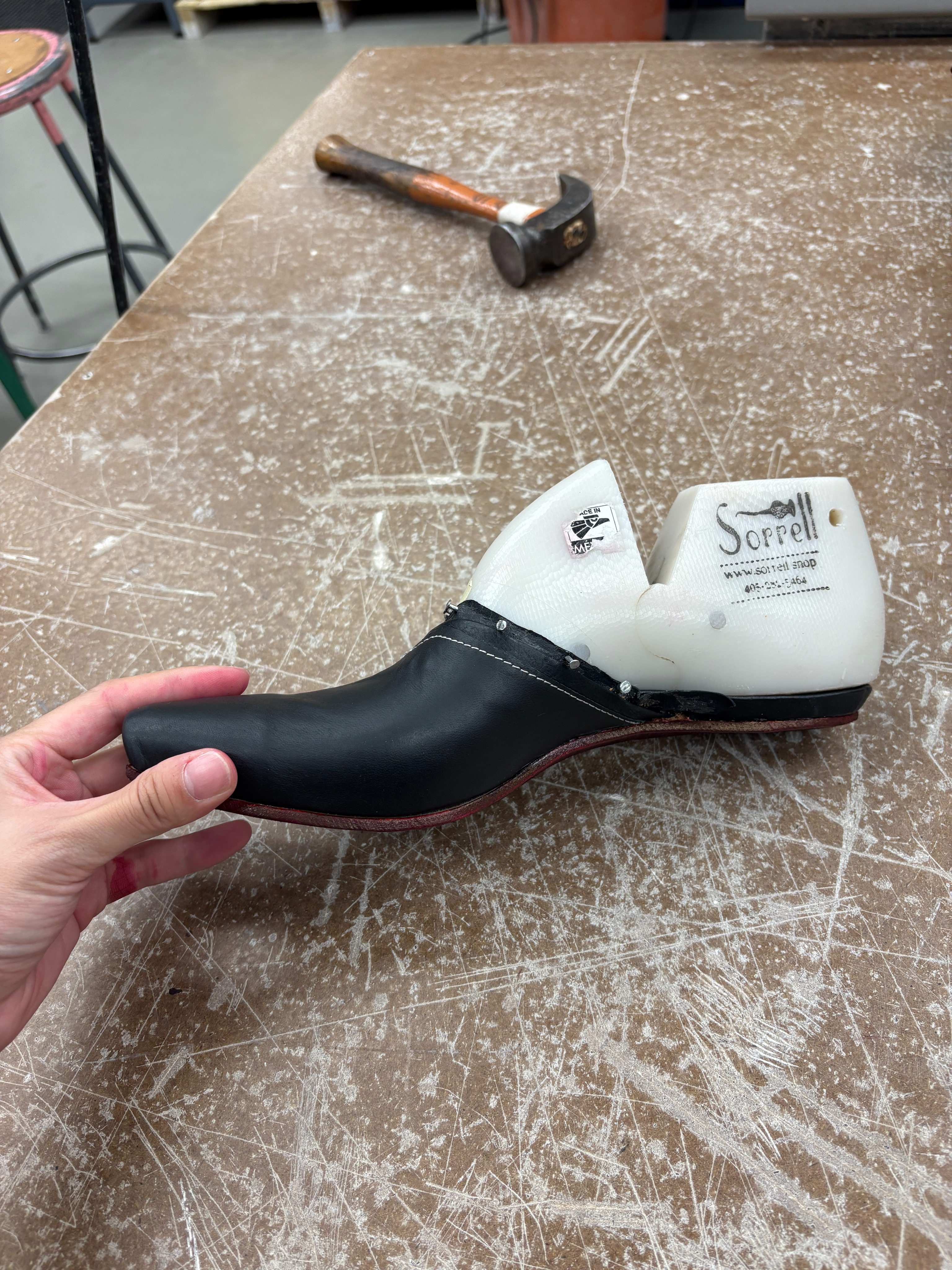 blurry photo of sunset over ocean with logo on top